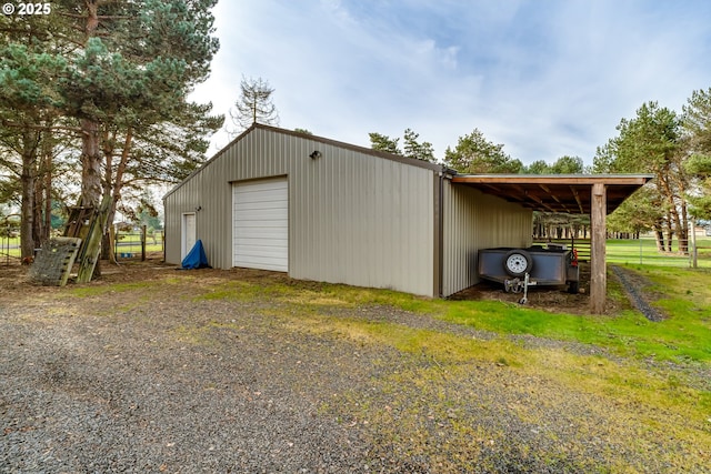 view of outdoor structure featuring a garage