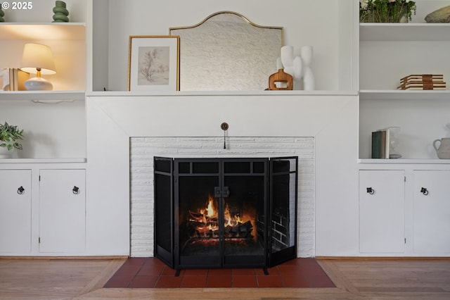 17787 Kelok Rd, Lake Oswego, OR 97034 - detailed view of a brick fireplace and wood finished floors