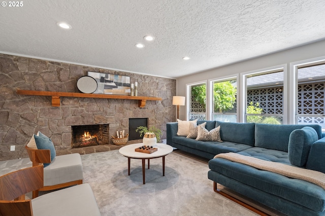 17787 Kelok Rd, Lake Oswego, OR 97034 - living area featuring a textured ceiling, a stone fireplace, and recessed lighting