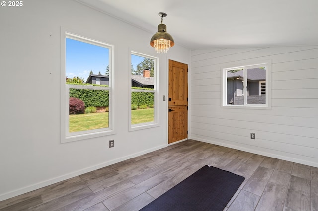 17787 Kelok Rd, Lake Oswego, OR 97034 - entryway with wood finished floors, wooden walls, and baseboards