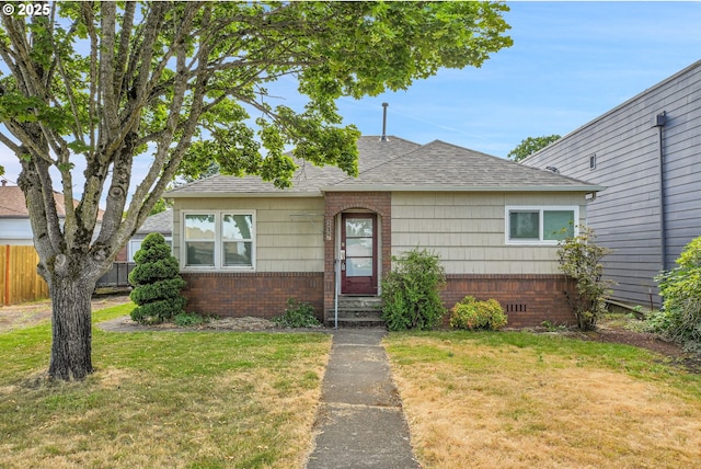 217 N Molalla Ave, Molalla, OR 97038 - bungalow-style house featuring roof with shingles, brick siding, and entry steps