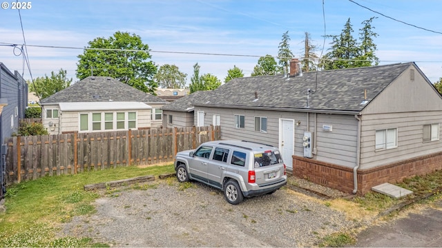 217 N Molalla Ave, Molalla, OR 97038 - view of front of home featuring a chimney and roof with shingles