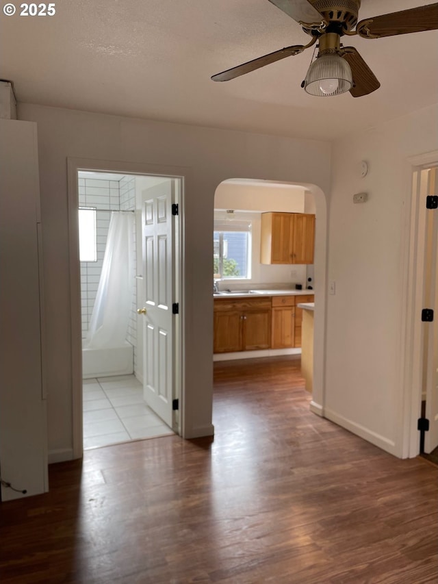 interior space featuring hardwood / wood-style flooring and sink