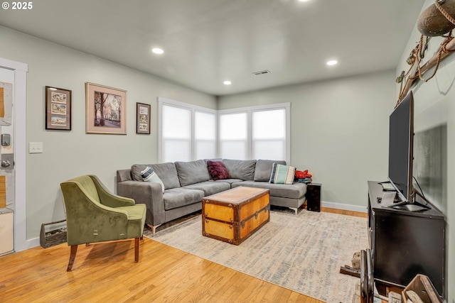 living room featuring light wood-type flooring