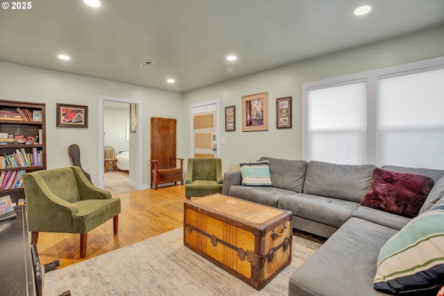 living room with light hardwood / wood-style flooring