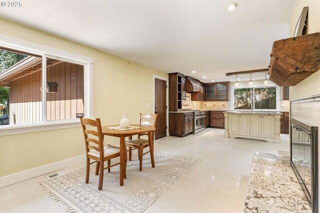 dining area featuring recessed lighting, baseboards, and visible vents
