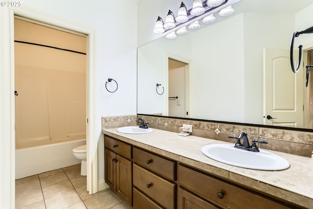 13902 SW Andrew Ter, Portland, OR 97224 - bathroom featuring tile patterned flooring, double vanity, and shower / bathtub combination