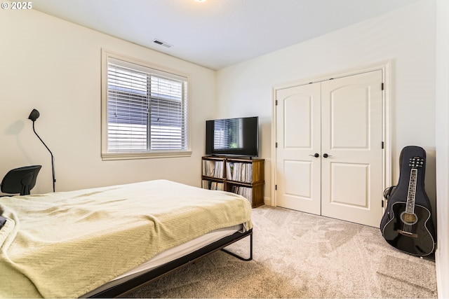 13902 SW Andrew Ter, Portland, OR 97224 - bedroom featuring light carpet and a closet