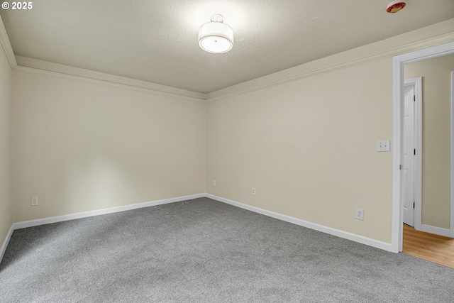 6423 SE Hull Ave, Milwaukie, OR 97267 - carpeted empty room featuring baseboards and a textured ceiling