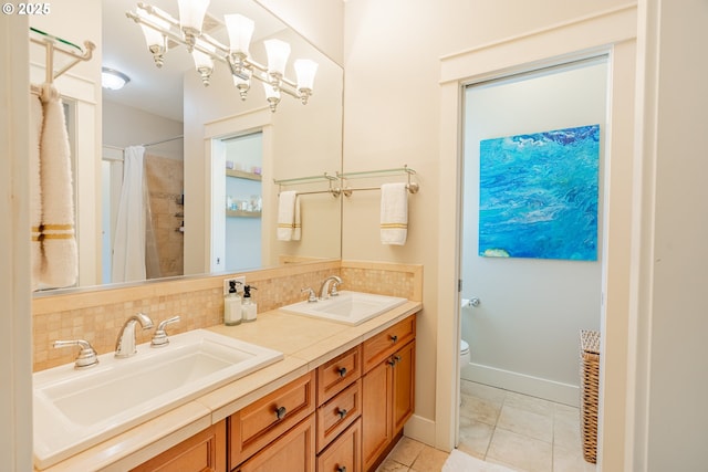 5227 SW Shattuck Rd, Portland, OR 97221 - bathroom featuring backsplash, tile patterned floors, toilet, double vanity, and curtained shower