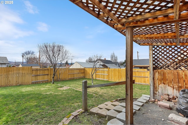 view of yard with a pergola and a fenced backyard