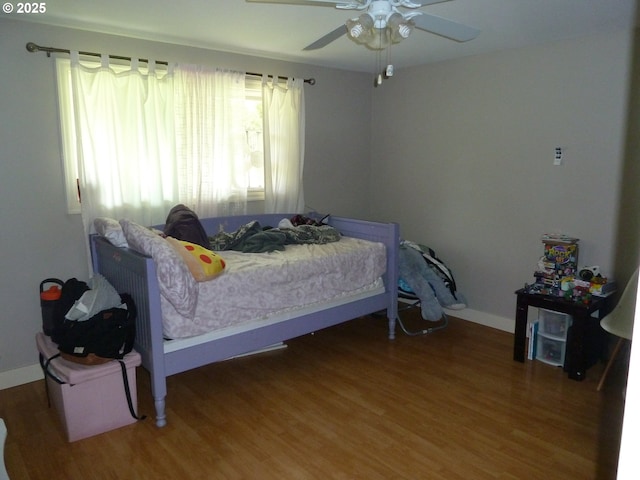 22225 SE Peggy Ann Dr, Damascus, OR 97089 - bedroom with wood finished floors, baseboards, and ceiling fan