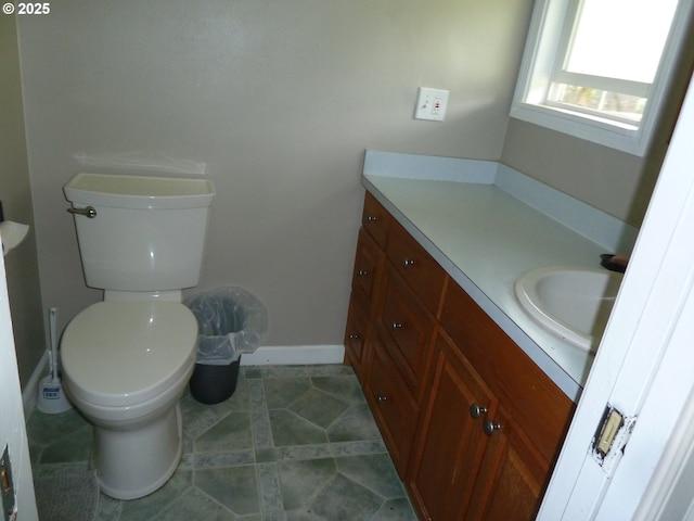 22225 SE Peggy Ann Dr, Damascus, OR 97089 - half bath featuring vanity, toilet, and baseboards
