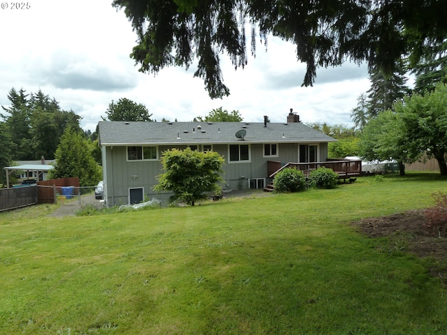 22225 SE Peggy Ann Dr, Damascus, OR 97089 - rear view of property featuring a wooden deck, a chimney, and board and batten siding