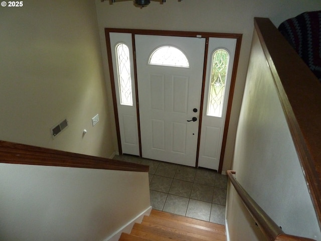 22225 SE Peggy Ann Dr, Damascus, OR 97089 - foyer with light tile patterned floors and stairway