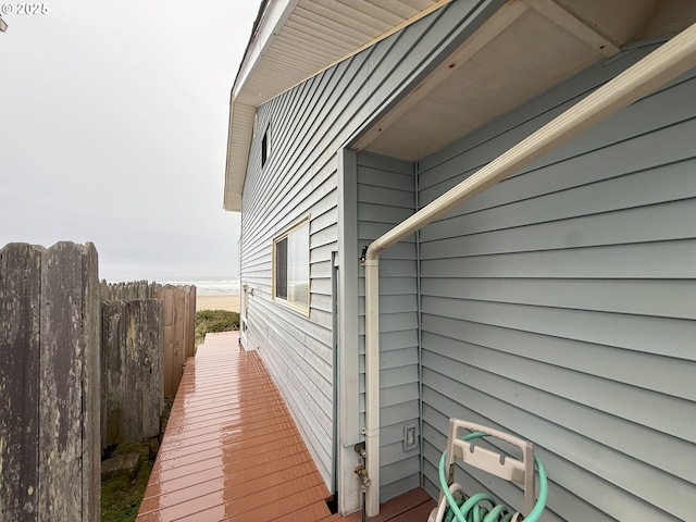 view of property exterior with fence