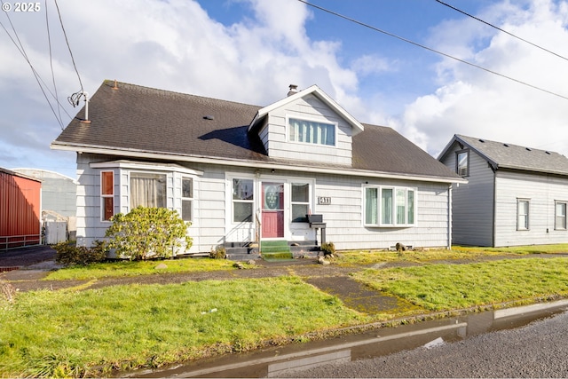 view of front facade featuring a front yard