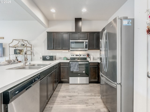 1939 NE 117th Ct, Vancouver, WA 98684 - kitchen with recessed lighting, a sink, stainless steel appliances, light wood-type flooring, and light countertops