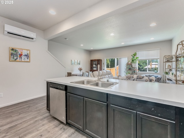 1939 NE 117th Ct, Vancouver, WA 98684 - kitchen with a sink, light countertops, open floor plan, dishwasher, and a wall mounted AC