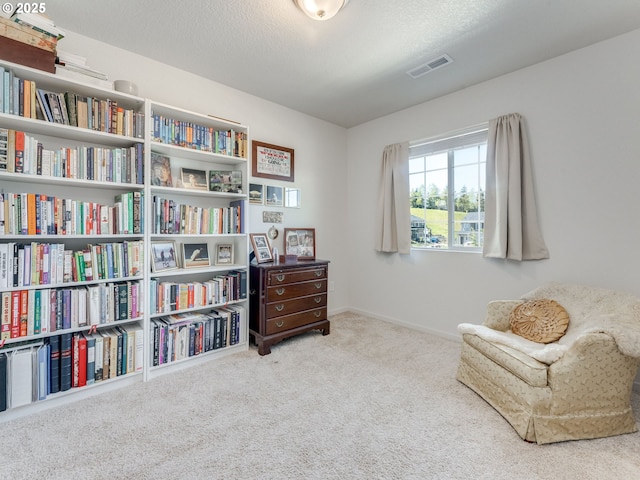 1939 NE 117th Ct, Vancouver, WA 98684 - living area with a textured ceiling, visible vents, carpet, and baseboards