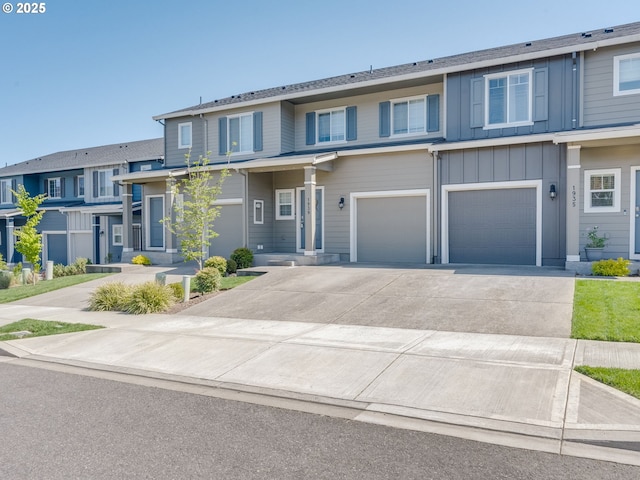1939 NE 117th Ct, Vancouver, WA 98684 - view of front of property featuring driveway, board and batten siding, and a garage