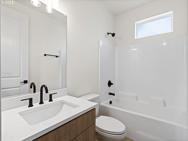 7586 N Alma Ave Unit 2, Portland, OR 97203 - bathroom with vanity, toilet, and washtub / shower combination