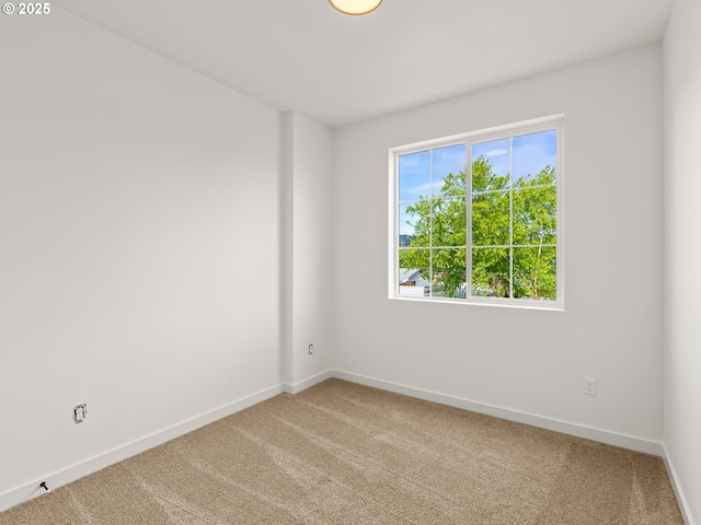 7586 N Alma Ave Unit 2, Portland, OR 97203 - spare room with carpet floors and baseboards