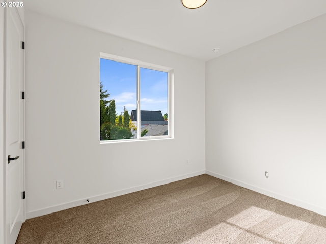 7586 N Alma Ave Unit 2, Portland, OR 97203 - carpeted spare room featuring baseboards