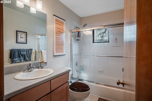 620 NW Naito Pkwy Unit B12, Portland, OR 97209 - full bath with bath / shower combo with glass door, toilet, and vanity
