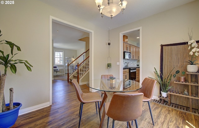 10201 NE 46th Ave, Vancouver, WA 98686 - dining space with wood finished floors, stairway, and a chandelier