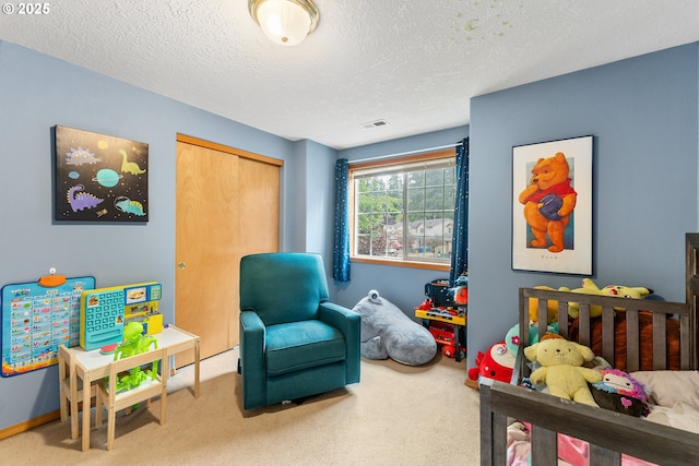 3929 SE 117th Pl, Portland, OR 97266 - carpeted bedroom featuring a textured ceiling and a closet