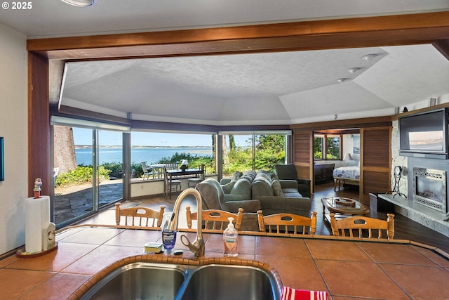 1230 Seagate Ave, Coos Bay, OR 97420 - sunroom / solarium with a sink, a water view, and vaulted ceiling
