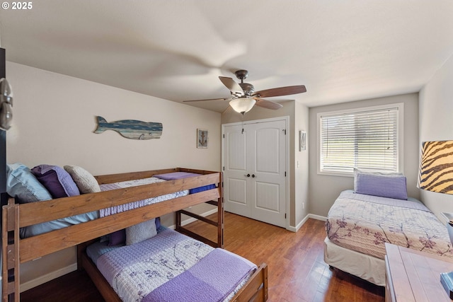 1230 Seagate Ave, Coos Bay, OR 97420 - bedroom featuring wood finished floors, baseboards, a closet, and ceiling fan