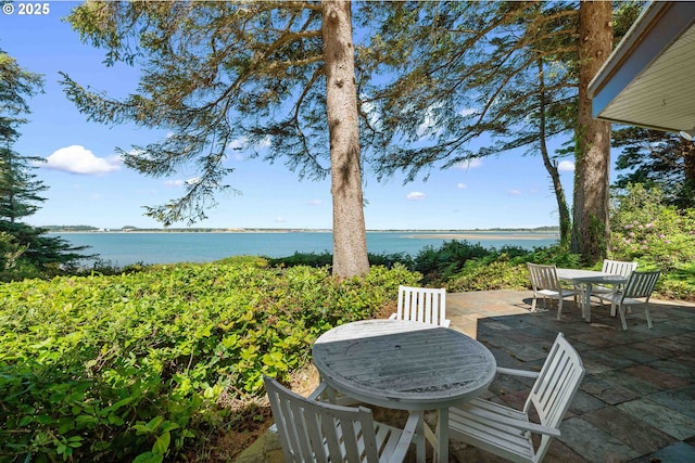 1230 Seagate Ave, Coos Bay, OR 97420 - view of patio with outdoor dining area and a water view