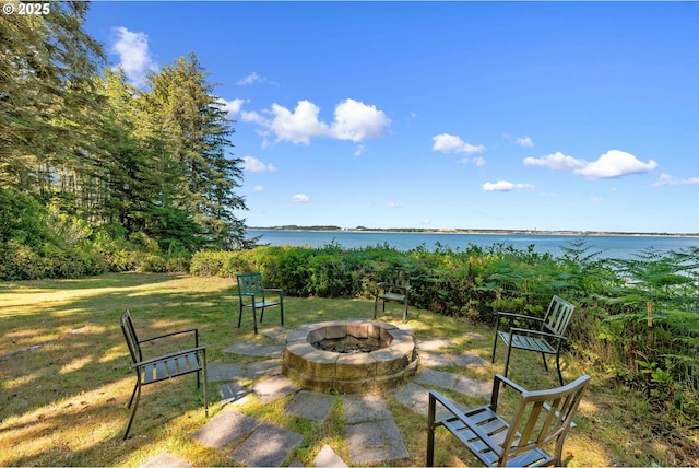 1230 Seagate Ave, Coos Bay, OR 97420 - view of patio featuring an outdoor fire pit and a water view