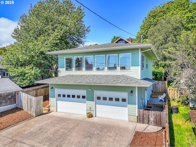 811 Glasgow Ave, Astoria, OR 97103 - view of front facade featuring driveway, an attached garage, and a shingled roof
