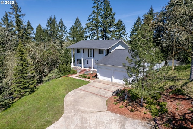 416 Elmar Dr, Winchester, OR 97495 - view of front facade featuring concrete driveway, a front lawn, an attached garage, and a shingled roof