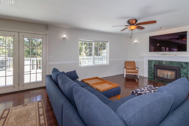 416 Elmar Dr, Winchester, OR 97495 - living room featuring ceiling fan, a premium fireplace, and wood finished floors