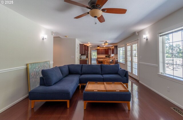 416 Elmar Dr, Winchester, OR 97495 - living room featuring wood finished floors, a ceiling fan, and baseboards