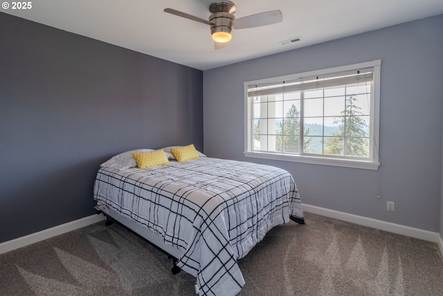 416 Elmar Dr, Winchester, OR 97495 - carpeted bedroom featuring baseboards and ceiling fan