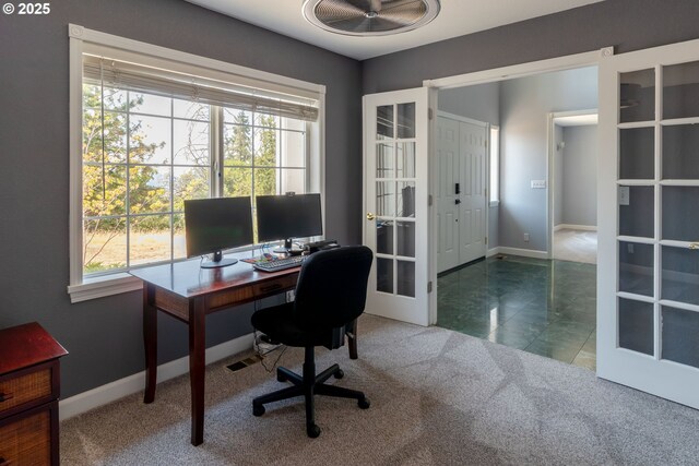 416 Elmar Dr, Winchester, OR 97495 - tiled office with french doors, carpet floors, and baseboards