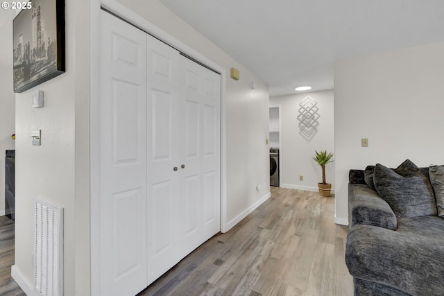 4634 Harriet Ave, Eugene, OR 97402 - living area featuring washer / clothes dryer, light wood-type flooring, and recessed lighting