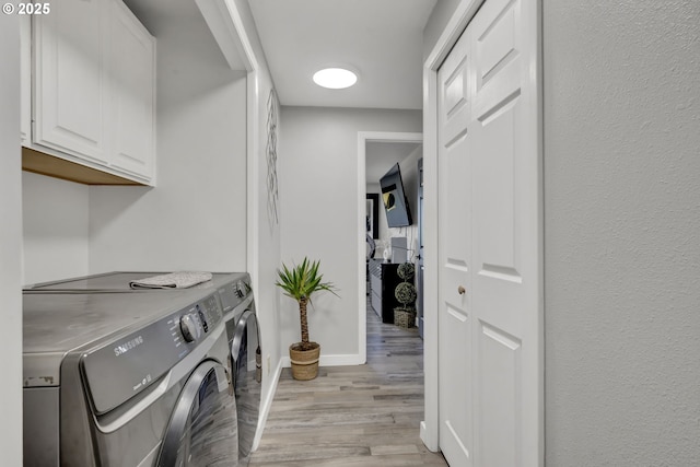 4634 Harriet Ave, Eugene, OR 97402 - laundry area featuring cabinet space, independent washer and dryer, and light wood-type flooring