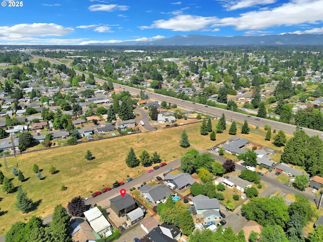 4634 Harriet Ave, Eugene, OR 97402 - aerial view of property's location with a mountainous background and nearby suburban area