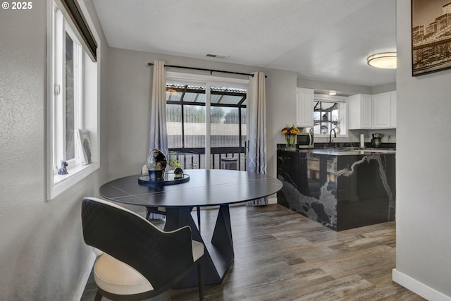 4634 Harriet Ave, Eugene, OR 97402 - dining space featuring dark wood-style floors and baseboards