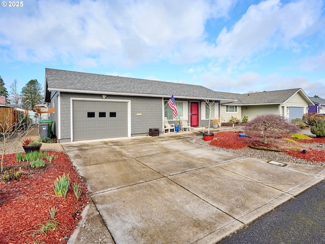 427 E Clackamas Cir, Woodburn, OR 97071 - ranch-style home featuring roof with shingles, driveway, and an attached garage