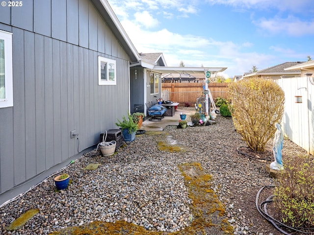 427 E Clackamas Cir, Woodburn, OR 97071 - view of yard featuring a patio and a fenced backyard