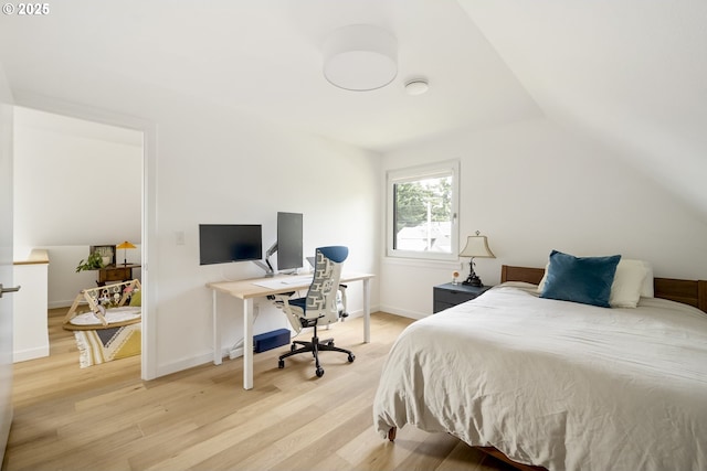 4889 NE Going St, Portland, OR 97218 - bedroom featuring light wood-style flooring, lofted ceiling, and an office area