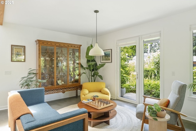 4889 NE Going St, Portland, OR 97218 - sitting room featuring finished concrete flooring