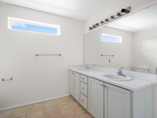15325 NW Central Dr Unit 301, Portland, OR 97229 - bathroom with plenty of natural light, double vanity, and tile patterned flooring
